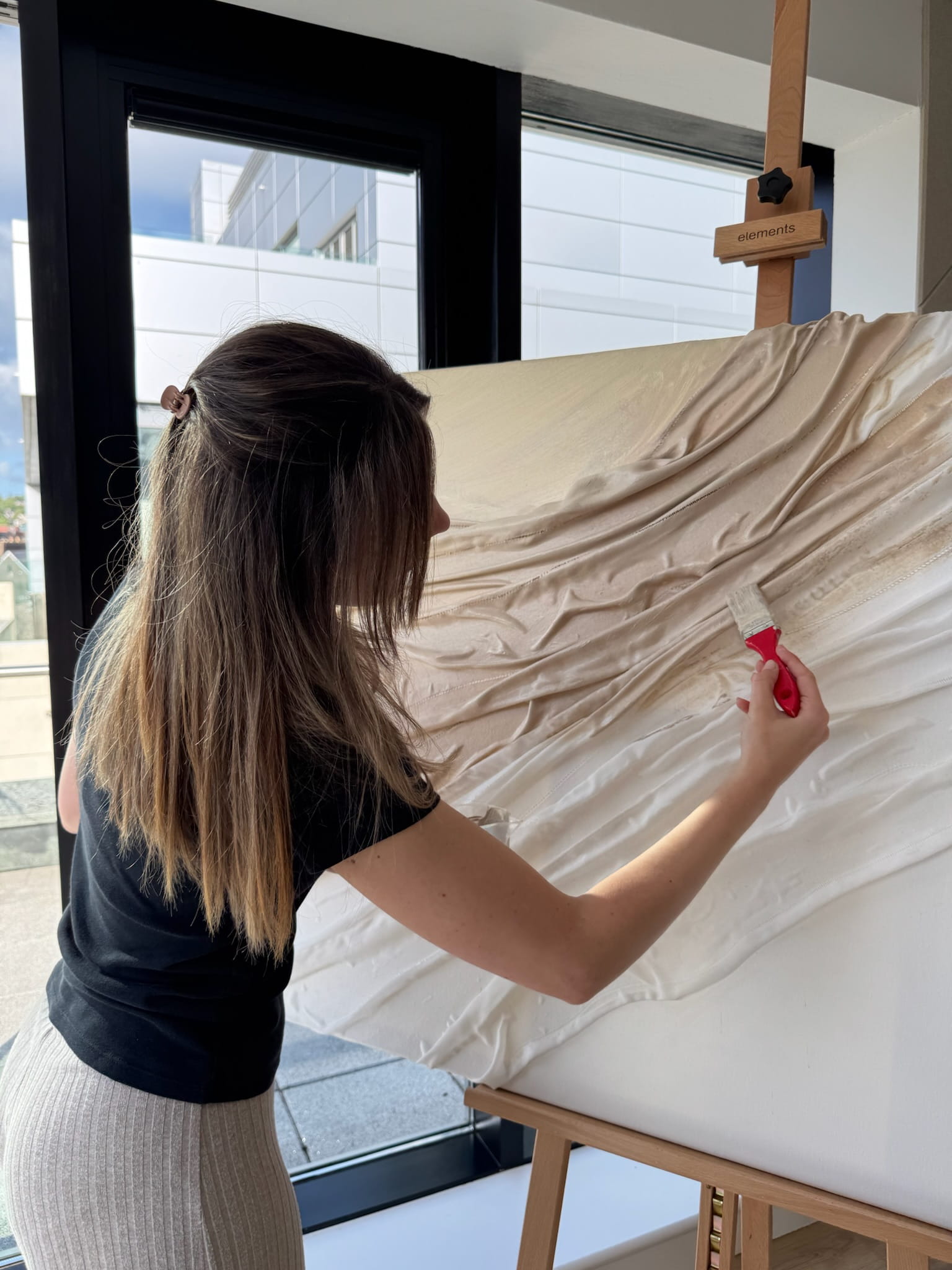Ivonne Coccaglio art studio process — mixed media and clay on canvas